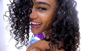Play Beautiful black teen showers and sucks cock
